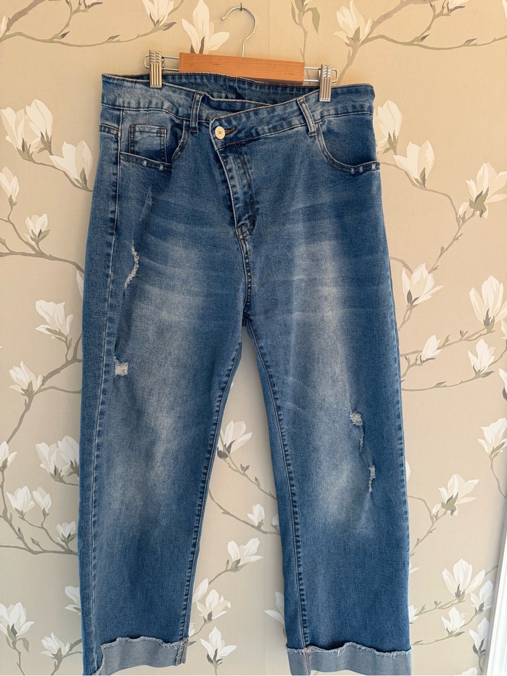 High-Rise Wide Leg Distressed Blue Jeans with asymmetrical zipper